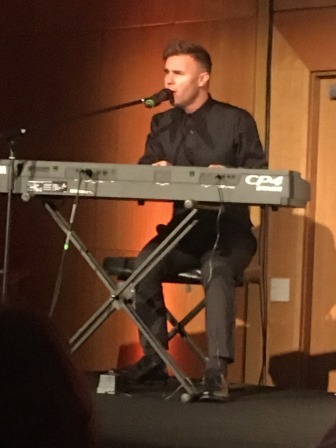 Gary Barlow playing on Keyboard